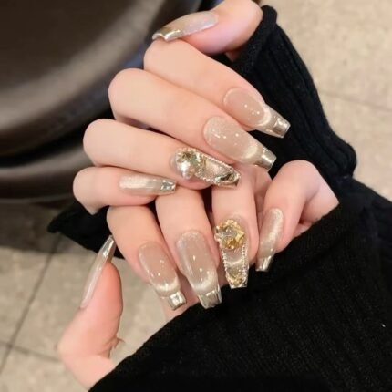 cat eye champagne French nails